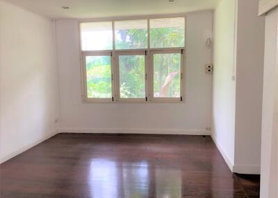 Empty living room with large window