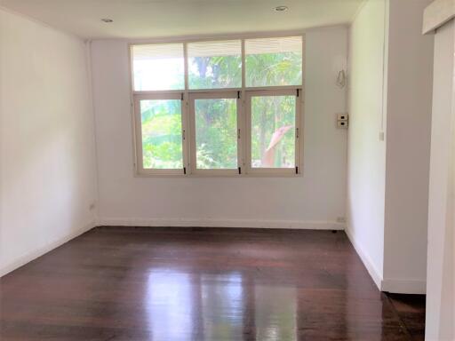 Empty living room with large window