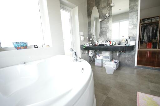 Bathroom with bathtub and vanity