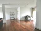 Spacious living room with wooden floor