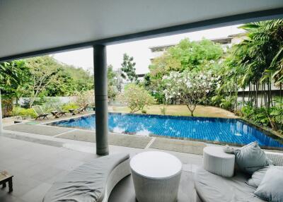 Covered patio with pool view