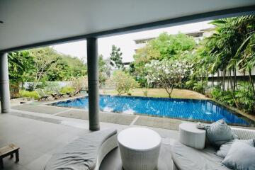 Covered patio with pool view