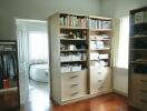 Organized bedroom with large shelves and walk-in closet