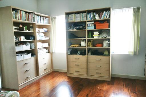 Storage space with shelving units and drawers