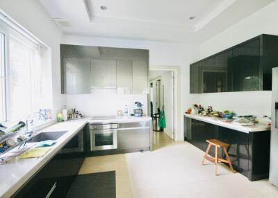 Modern kitchen with stainless steel appliances and ample counter space