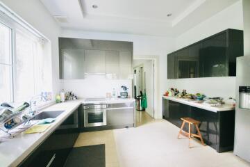 Modern kitchen with stainless steel appliances and ample counter space