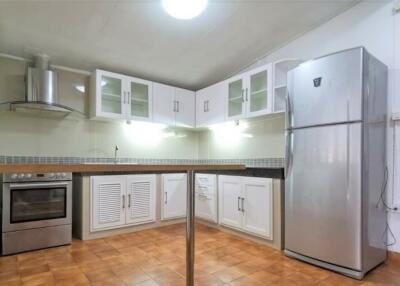 Modern kitchen with appliances and cabinets