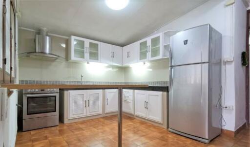 Modern kitchen with appliances and cabinets