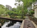 Outdoor garden with pond and walkway