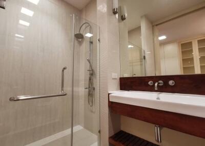 Modern bathroom with glass shower and vanity