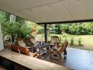 Covered outdoor patio with garden view