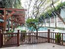 Outdoor area with pool and seating arrangements