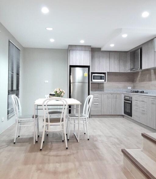 Modern kitchen with dining area