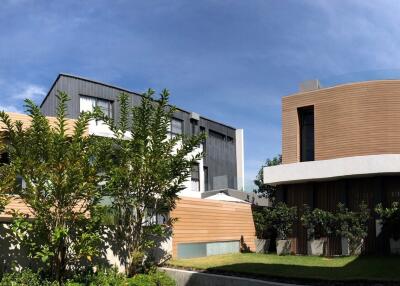 Modern building with garden and trees