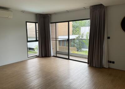 Spacious living room with large windows and a modern design