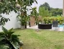 Backyard with pool and seating