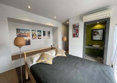 Well-decorated modern bedroom with ensuite bathroom