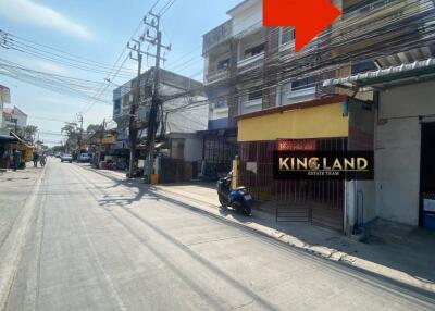 Street view of property with visible building and surroundings