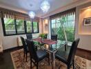 Elegant dining room with modern furniture and large windows