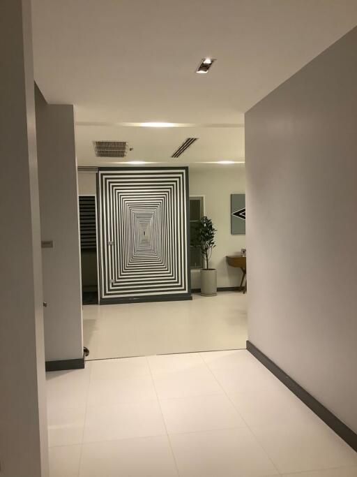 Modern hallway with abstract wall art