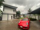 Modern house exterior with car in driveway