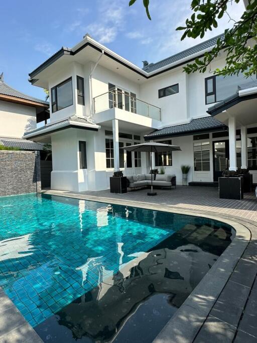 Modern two-story house with swimming pool