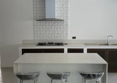 Modern kitchen with island and stools