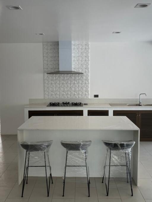 Modern kitchen with island and stools