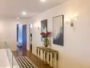 Modern hallway with artwork and console table