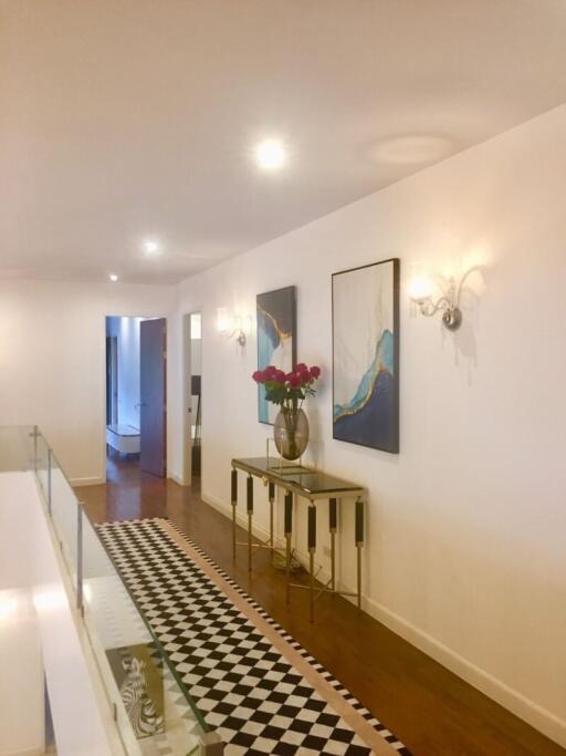 Modern hallway with artwork and console table