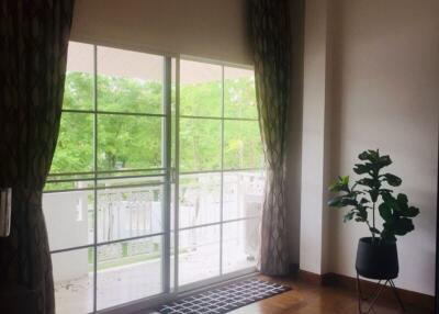 spacious living room with large windows and a view