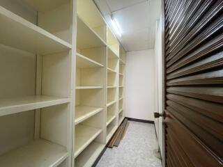 Storage room with built-in shelves