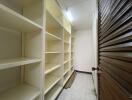 Storage room with built-in shelves