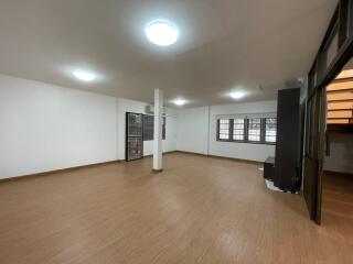 Spacious living room with large windows