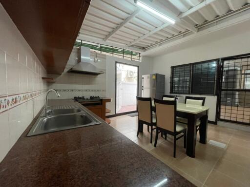 Spacious kitchen with dining area