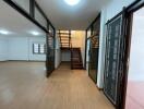 Spacious main living area with staircase