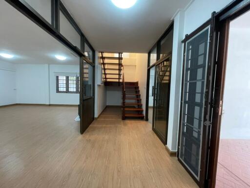 Spacious main living area with staircase