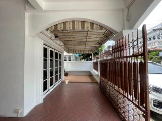 Covered outdoor patio with gate