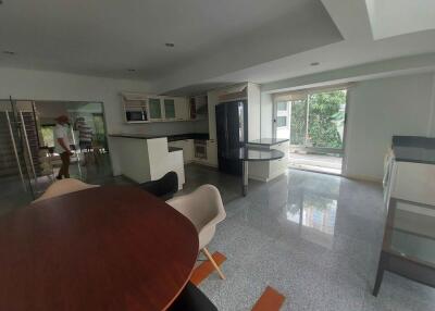 Modern kitchen with dining table and chairs