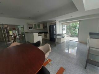 Modern kitchen with dining table and chairs