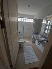 Modern bathroom with a shower and a single sink