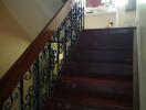 Photo of a staircase with ornate railing