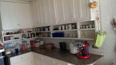 Kitchen with countertop and cabinets