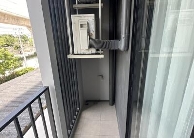 Small balcony with air conditioning units