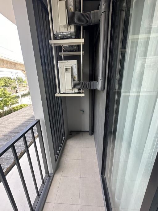 Small balcony with air conditioning units