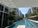 Modern apartment complex with outdoor swimming pool