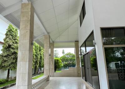 Main entrance with pillars and glass windows