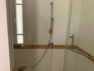 Shower area with glass door