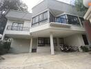 Front view of a modern residential building with garage