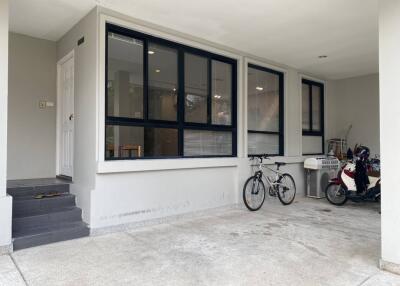 Garage area with bicycles and motorbike